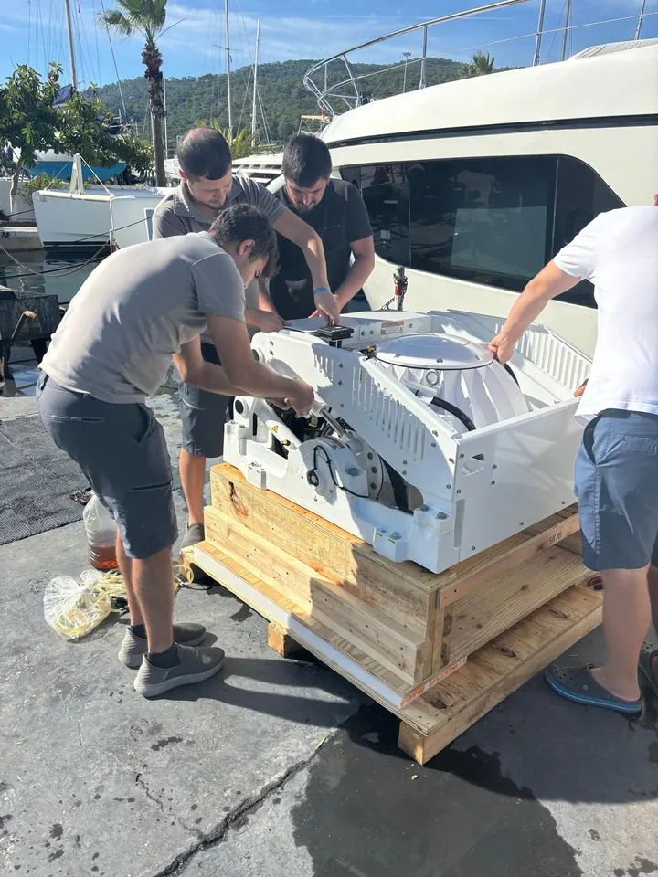 Our team unpacking a Seakeeper gyro stabilizer