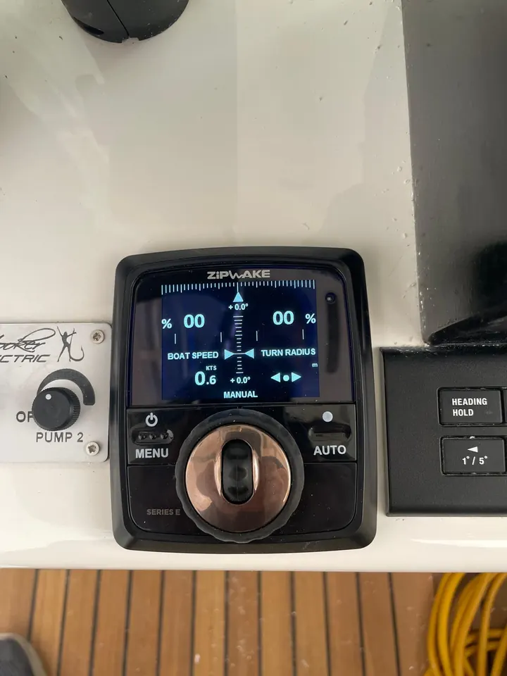 Zipwake automatic trim control panel at the helm